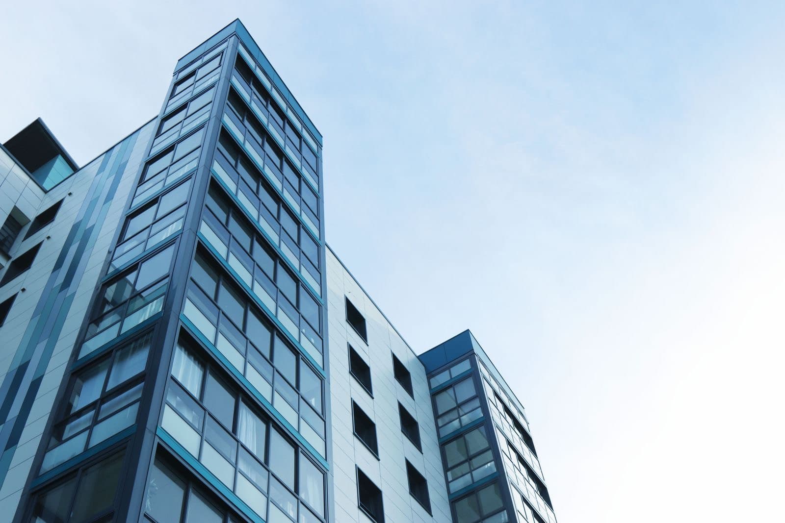 Modern apartment building where operations can run on shared rules